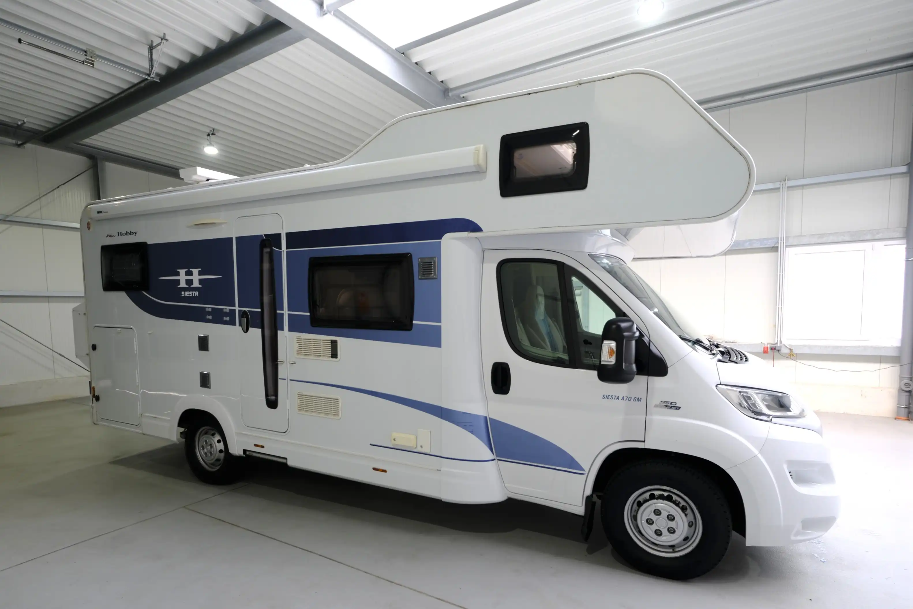 HOBBY Siesta A 70 GM/2.Hand/Festbett/Garage/2xKlima/Markise/6 Sitz 6 Schlafplätze/Luftfederung